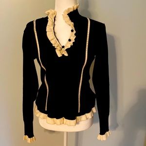 Cabi Adorn pullover in black and crème. Size S